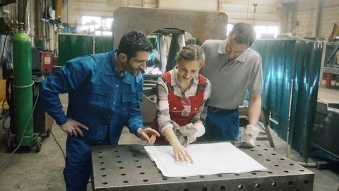 Worker in factory or workshop discussing project Stock Footage 119912668