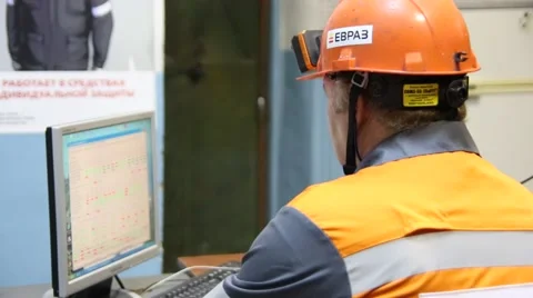 Worker at the factory is working at the computer Stock Footage 53341461