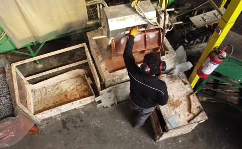 WORKER IN A FACTORY WORKING METAL Stock Footage 218570861