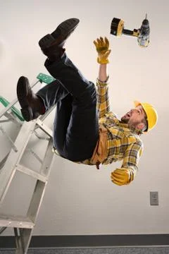 Worker Falling From Ladder Foto stock