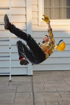 Worker Falling From Ladder Stock Photos