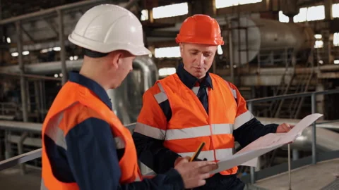 Worker feedback, Worker review, Studying blueprints Video stock 274209246