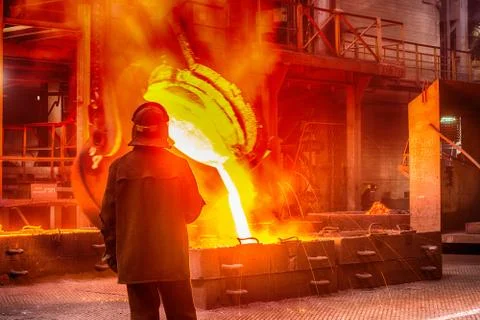 Worker on ferroalloy factory Stock Photos