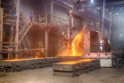 Worker on ferroalloy factory Stock Photos