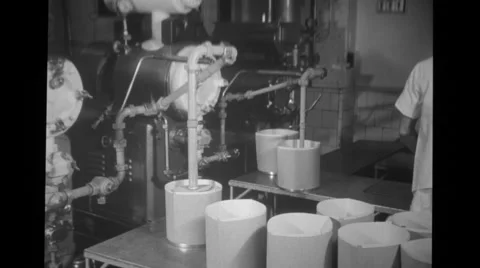 Worker filling the container at Blue Seal Dairy plant Stock Footage 37595752