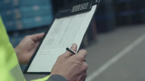 Worker Filling Inventory Checklist On Writing Board, Storage Hall, Close Up Stock Footage 341304234