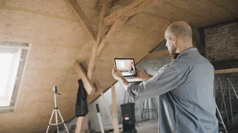 Worker filming his construction site with a tablet computer Stock Footage 149291853
