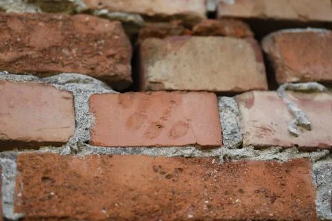 Worker fingerprints on brick Stock Photos