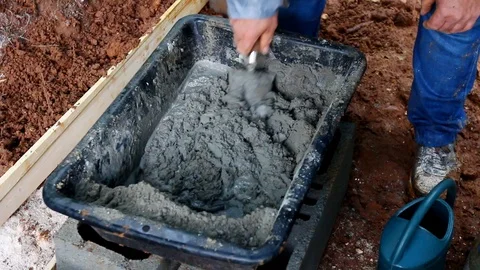 Worker finish to mix cement, sand and water. Stock Footage 109239204