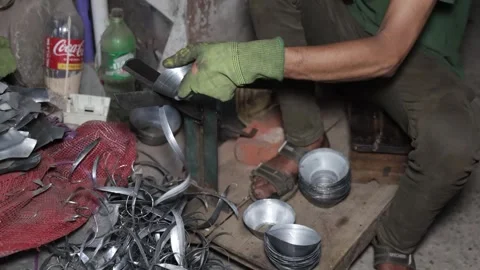 Worker Finishing Small Aluminium Cups In Workshop Stock Footage 339219994