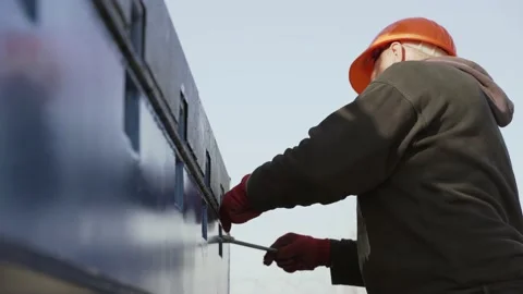 Worker fixes machine on a plant. Close-up Stock Footage 171371118