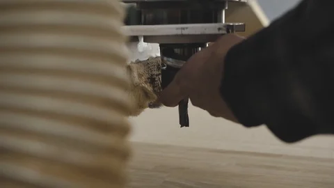 The worker fixes the necessary drill in the robotic machine Stock Footage 105044349