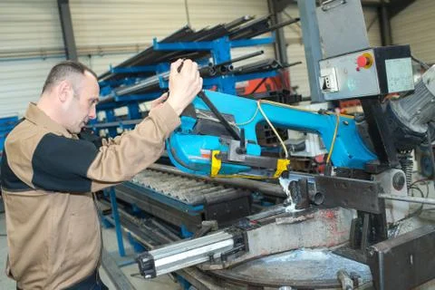 Worker fixing a machine Stock Photos
