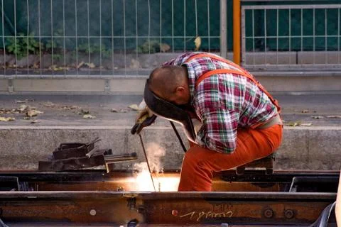 Worker Fixing Rails Foto stock