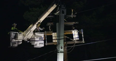 Worker Fixing a Transformer Stock Footage 119678615