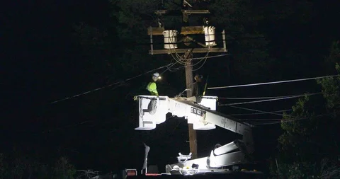 Worker Fixing a Transformer Stock Footage 119678653