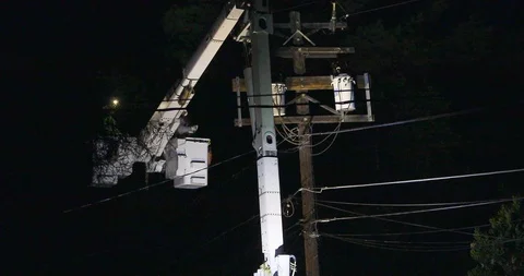Worker Fixing a Transformer Stock Footage 119678936