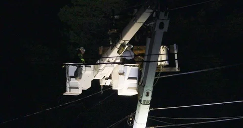 Worker Fixing a Transformer Stock-Footage 119679073