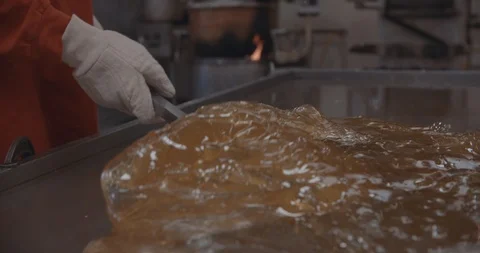 Worker Flipping Candy In Slow Motion 스톡 동영상 105346070