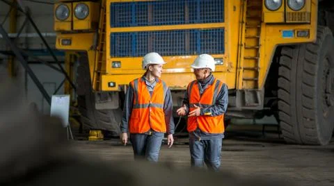 Worker in front of a bug truck Stock Photos