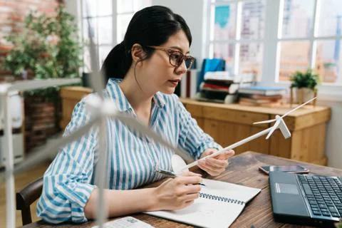 Worker get inspiration while looking at windmill 스톡 사진