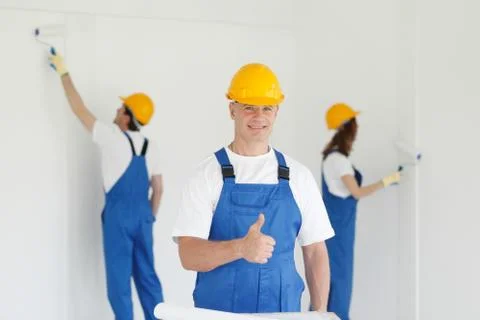 Worker gives thumb up Stock Photos