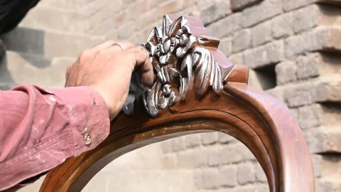 Worker Giving  Silver Effects To Brown Furniture Video stock 164958700