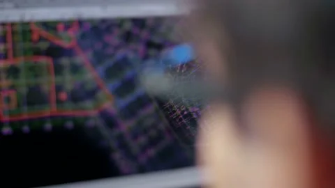 Worker with glasses creates a complex architectural project on a computer Video stock 135315022