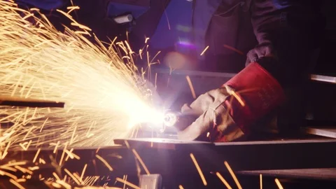 Worker in gloves cutting sheet metal with acetylene or oxygen torch. Video stock 120821922
