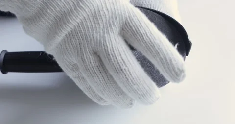 Worker in gloves disc replacement with angle grinder Stock Footage 125609476