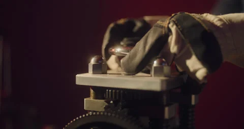Worker in gloves is twisting some valve using two hands Stock Footage 130967867