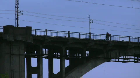 Worker goes on the bridge.  Stock Footage 276643