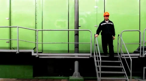 Worker Goes By Platform And Lowered Down Video stock 10790374