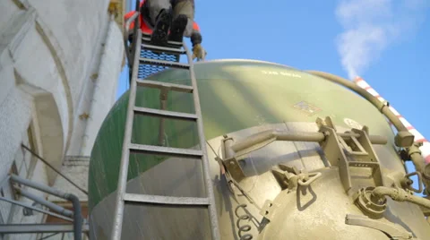 A worker going down the ladder Stock Footage 63161265