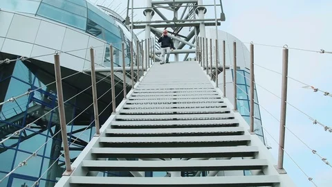 Worker going down stairs Video stock 73470346