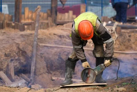 Worker grinder disker Stock Photos