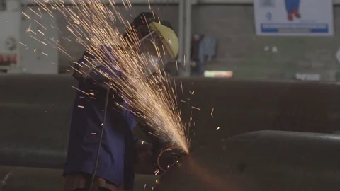 A worker grinding the Iron Stock Footage 129654828