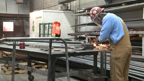 Worker Grinding Medal Stock Footage 127530923