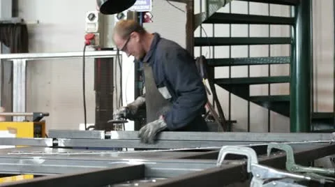 Worker grinding metal - dolly Stock-Footage 22157886