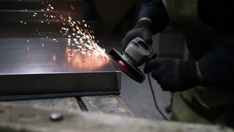 Worker grinding metal. Super slow motion 240 fps Stock Footage 153578824