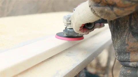 Worker grinds the board Stock Footage 97858854