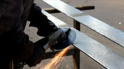 Worker grinds metal bar Video stock 873414