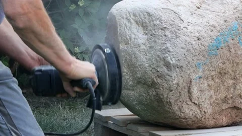 Worker grinds raw stone,  grinding machine, sound Stock Footage 221502489