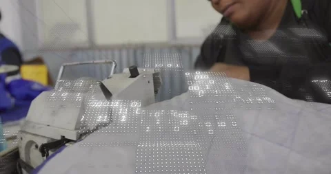 Worker guiding quilt under machine with ring, stitching lines, checking pattern Stock Footage 321099608