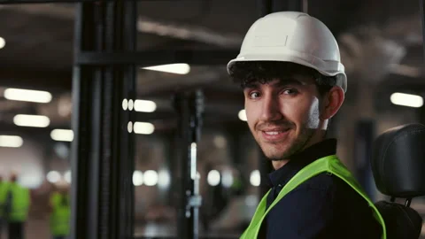 Worker Guy in Special Uniform Standing in Warehouse. People Portrait Stock Footage 244135555