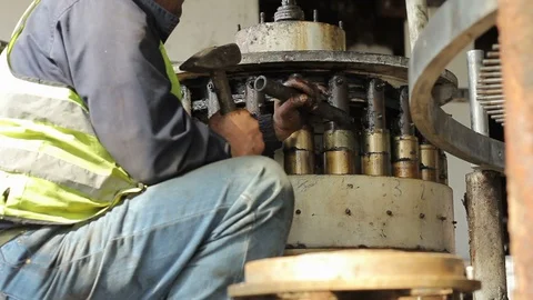 Worker with a hammer hit Stock-Footage 87513628