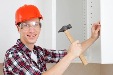 Worker with a hammer Foto stock