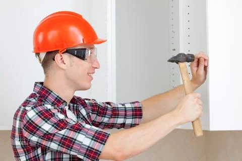 Worker with a hammer Foto stock