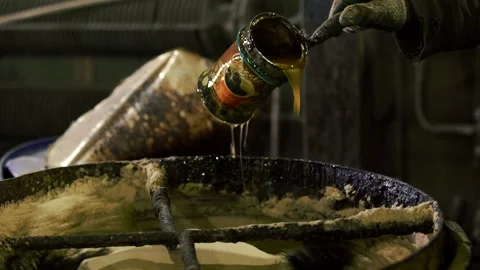 Worker hand add water in portion for making batch Stock Footage 145618377