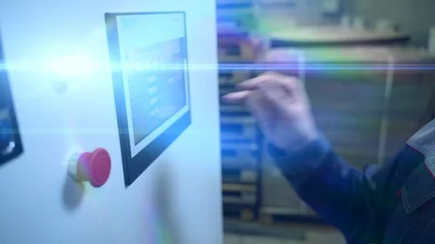 Worker hand clicks touch screen of control panel on industrial computerized Stock Footage 124093230
